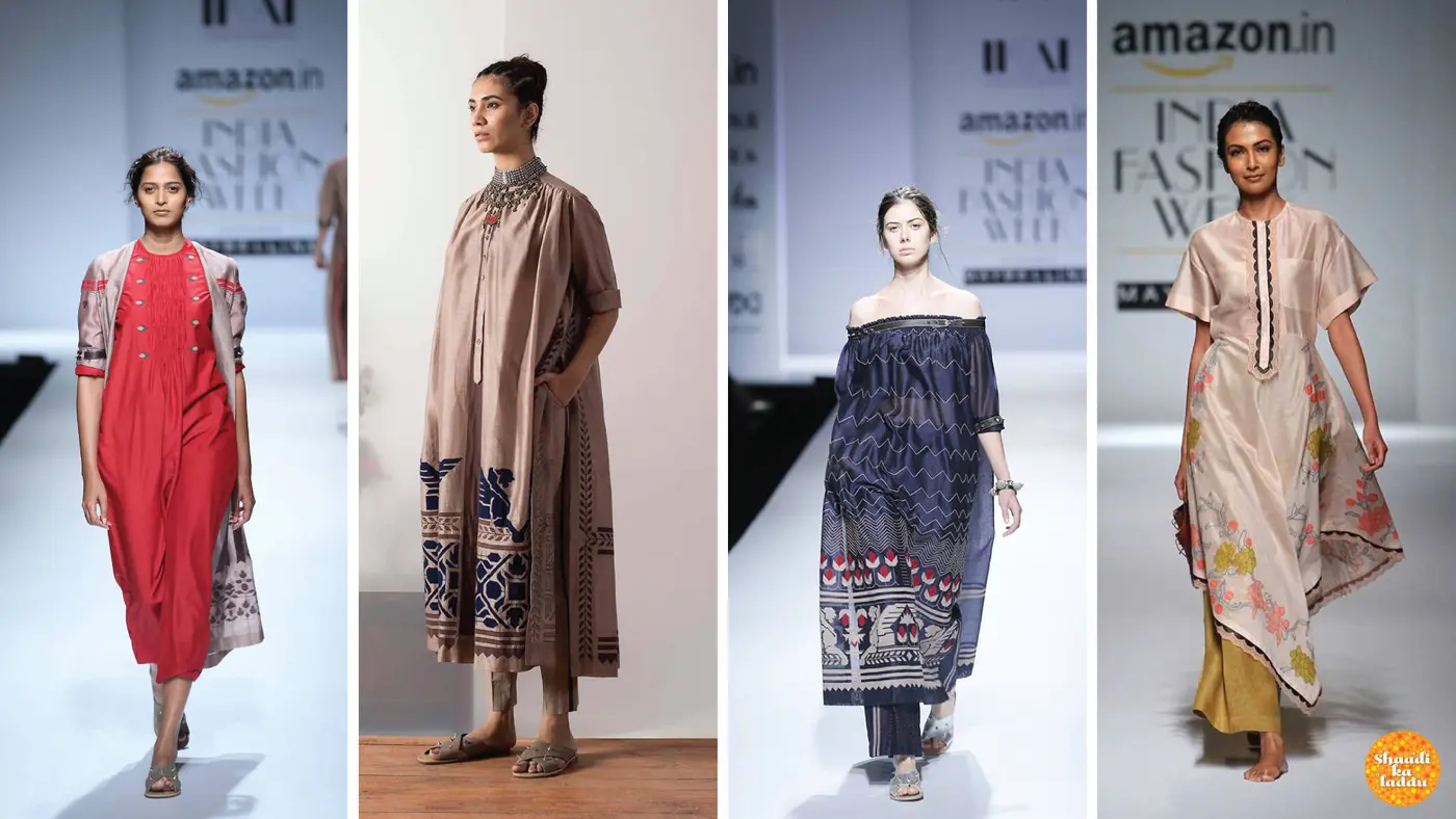 Models on ramp in designer indo western dresses
