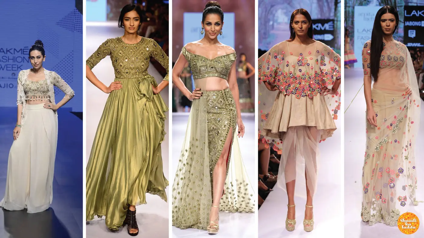Models on ramp wearing designer clothes